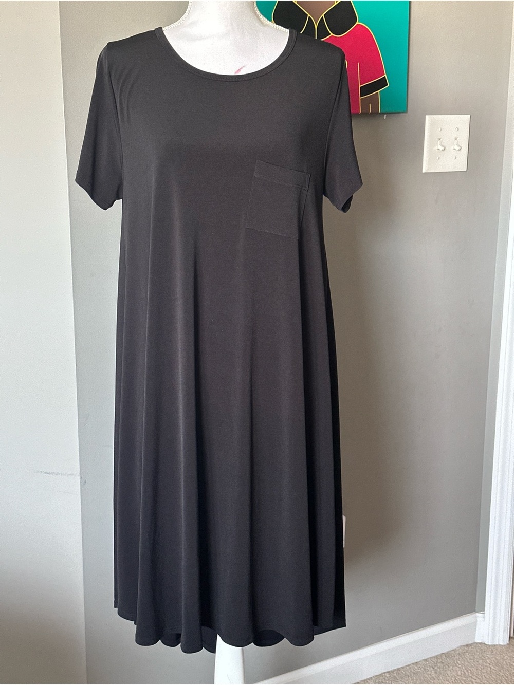 LuLaRoe Carly Black Asymmetrical Short-Sleeve Pocket Dress